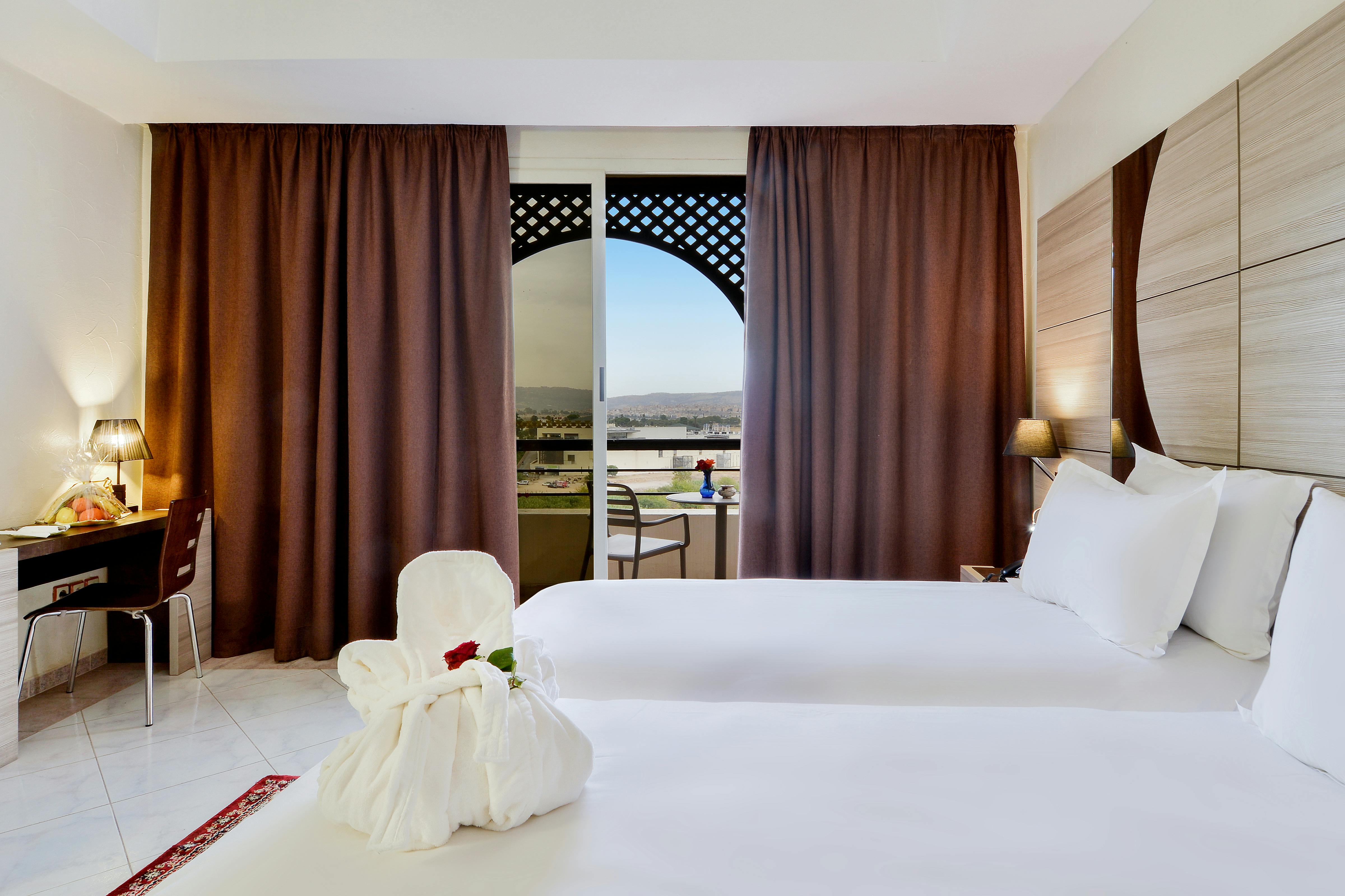 Chambres partenaire avec suites discrètes et confort premium pour séjours confidentiels